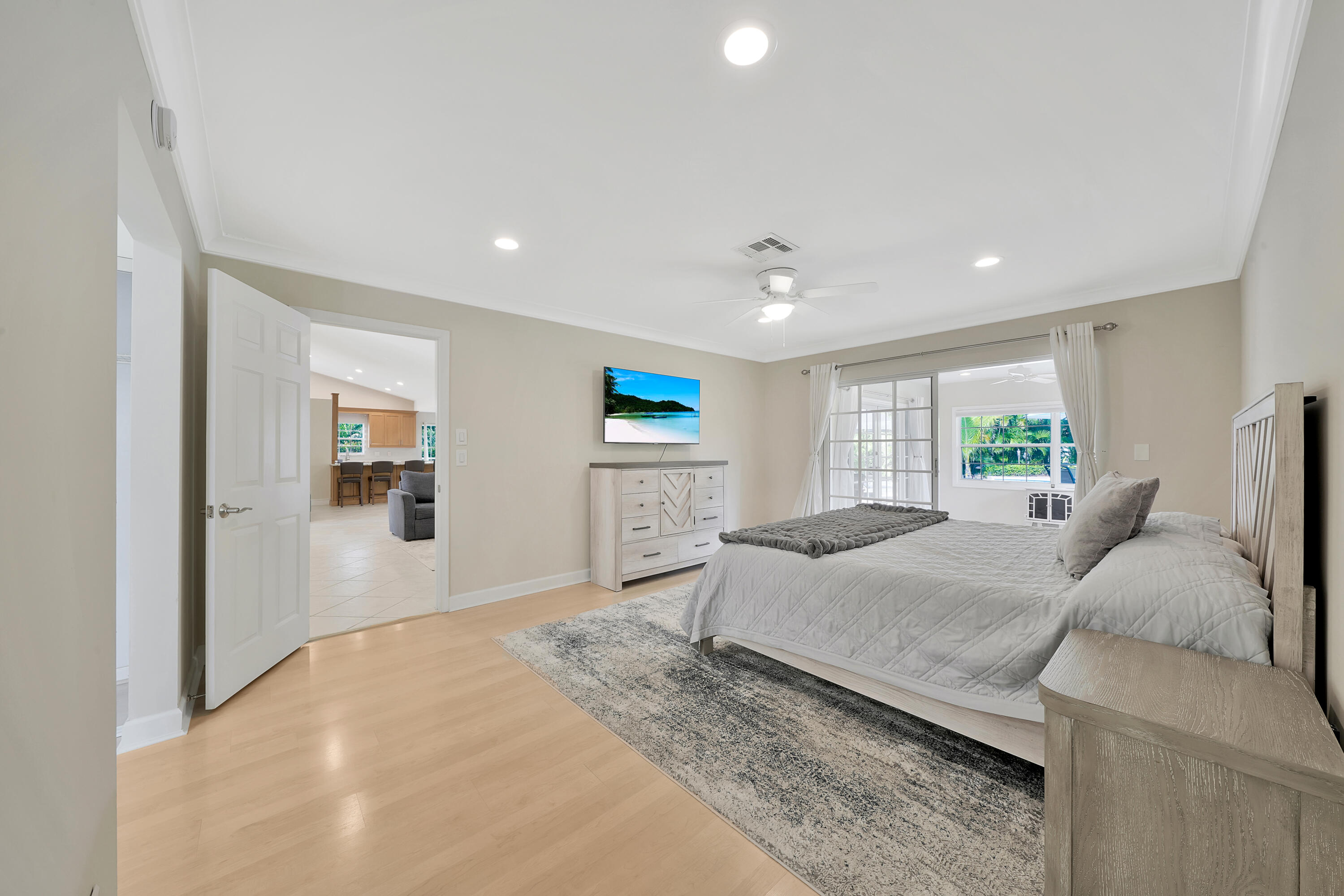 2475 Northwest 25th Street Boca Raton, FL 33431 - Photo 45 of 72 a living room with furniture and a window