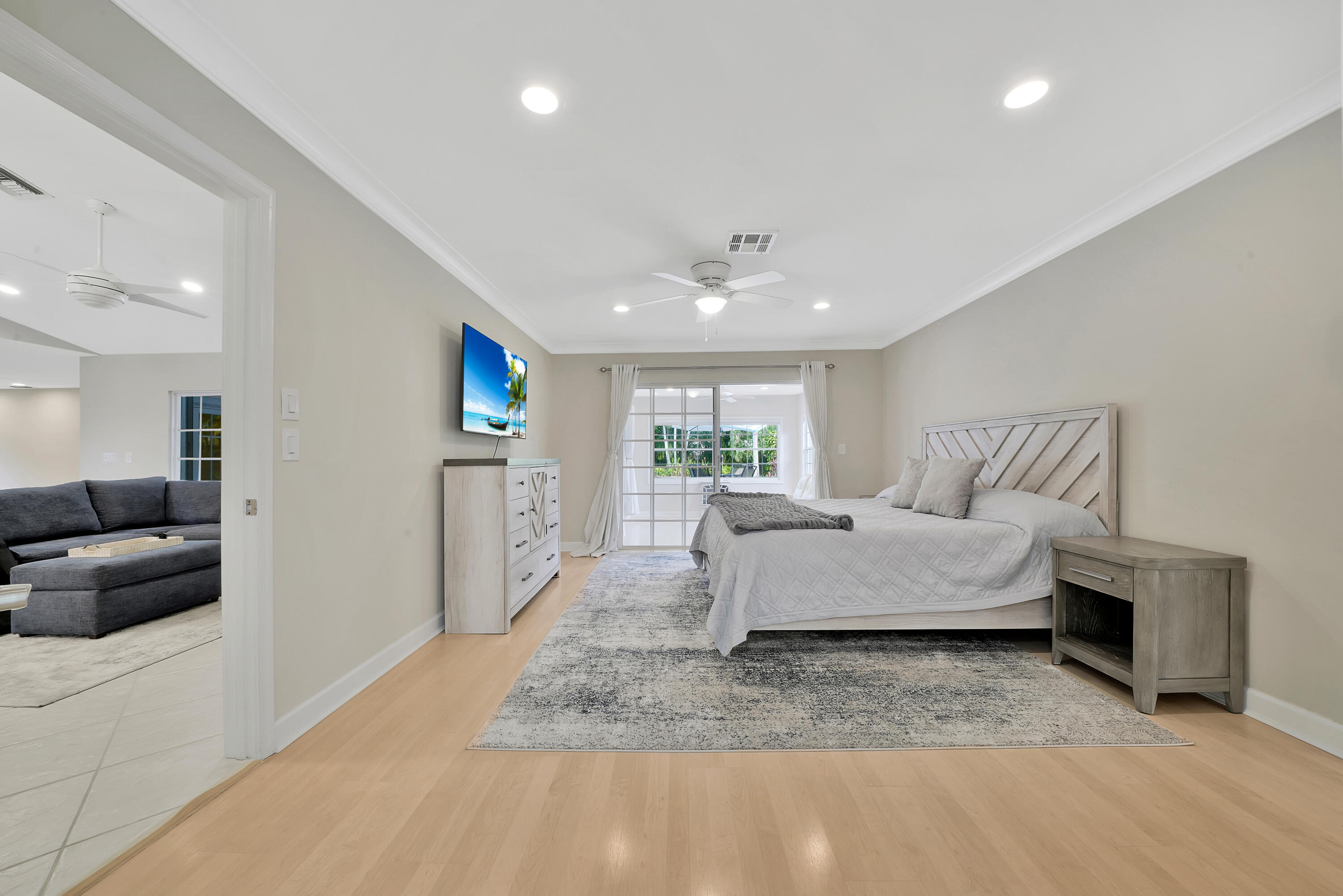 2475 Northwest 25th Street Boca Raton, FL 33431 - Photo 47 of 72 a living room with furniture and a couch