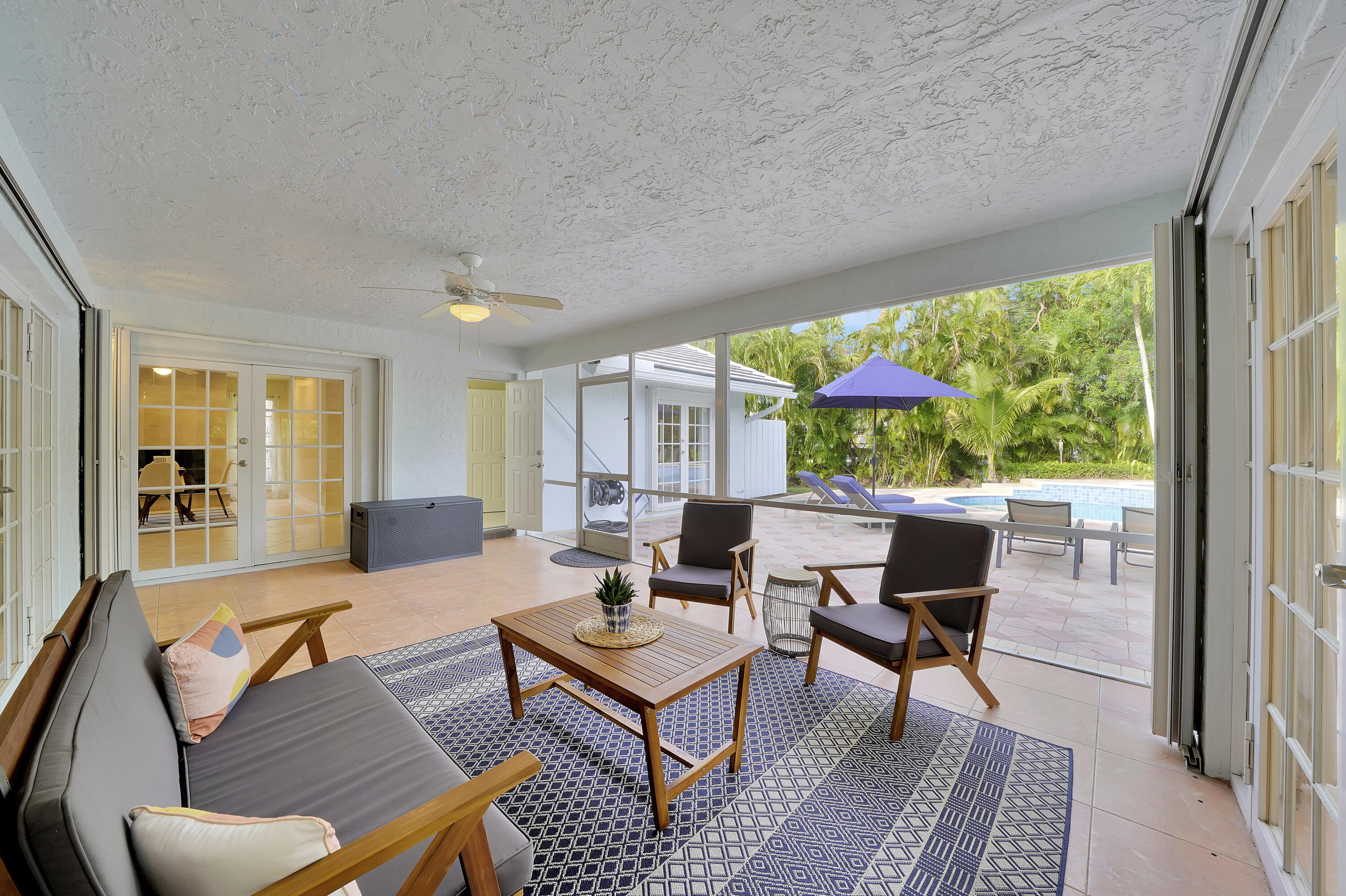 2475 Northwest 25th Street Boca Raton, FL 33431 - Photo 62 of 72 a living room with furniture and a large window