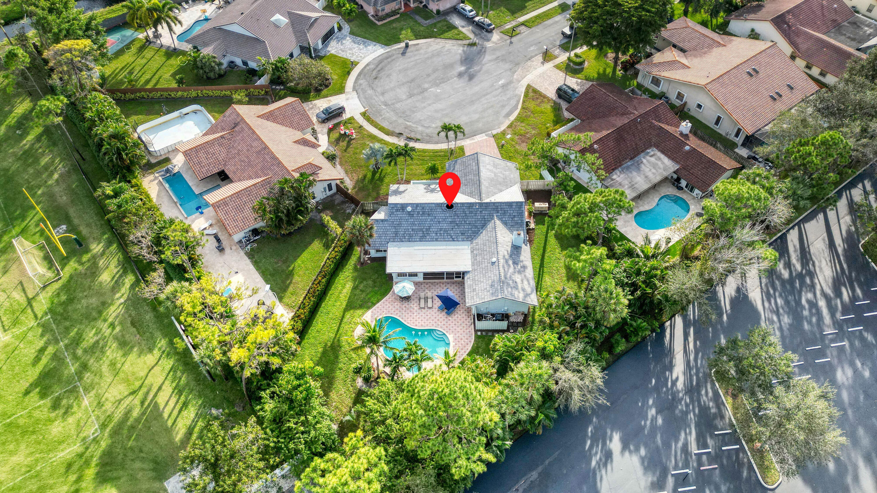 2475 Northwest 25th Street Boca Raton, FL 33431 - Photo 68 of 72 an aerial view of house with yard swimming pool and outdoor seating