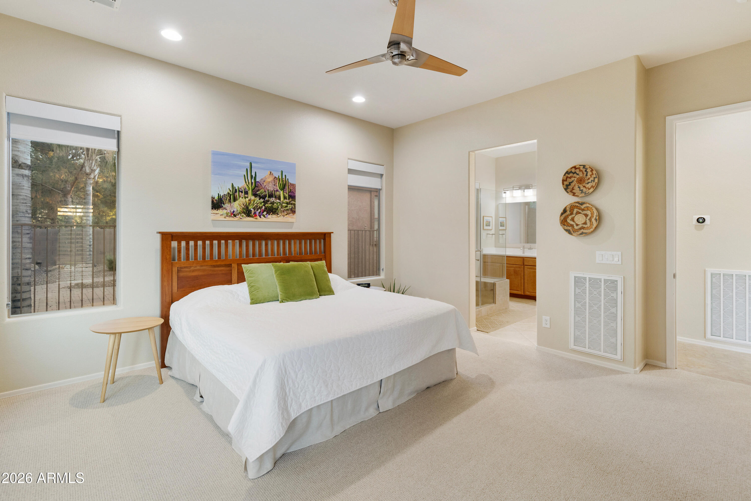 5291 South Sugarberry Court Gilbert, AZ 85298 - Photo 34 of 67 a bedroom with a bed and a chandelier