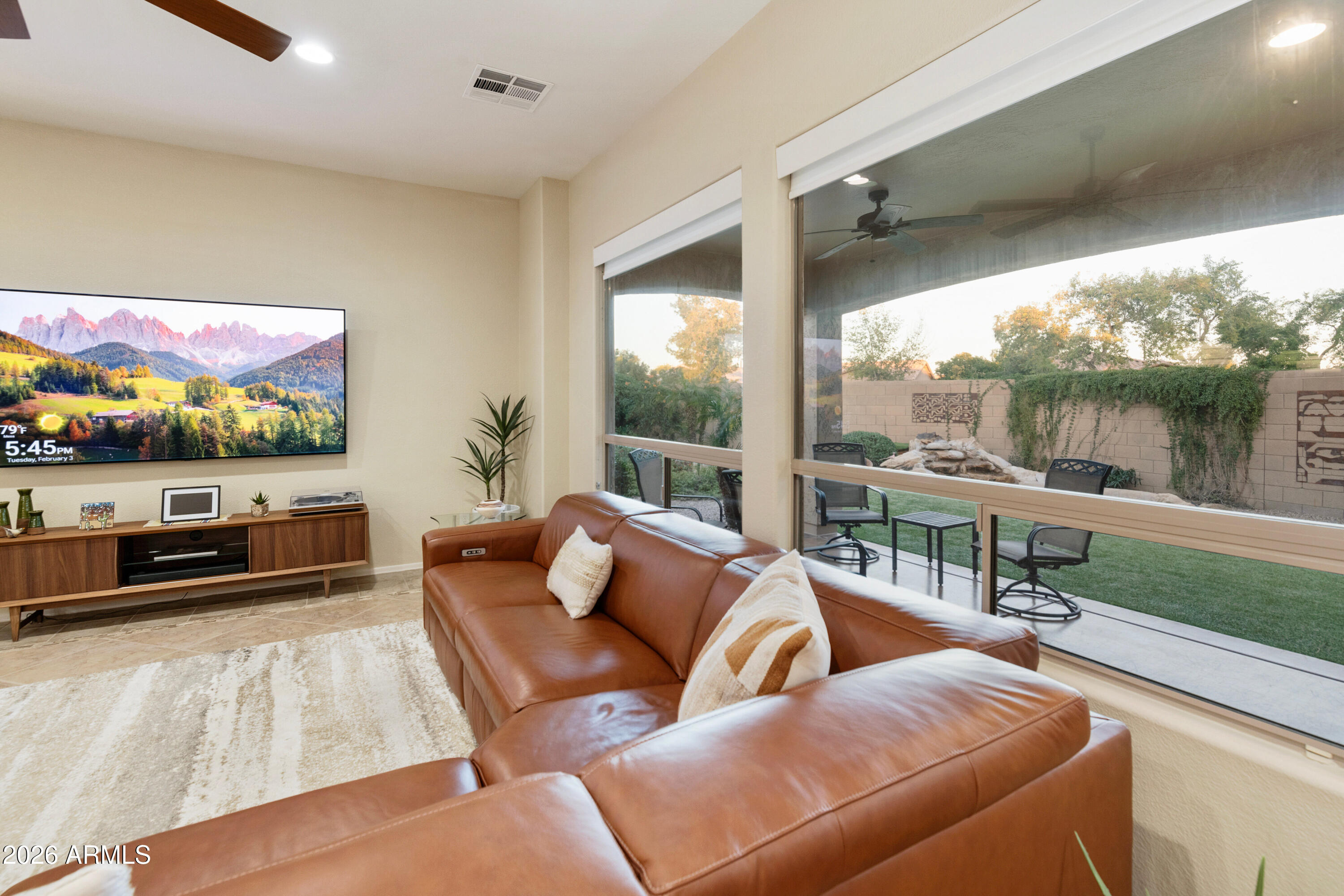 5291 South Sugarberry Court Gilbert, AZ 85298 - Photo 39 of 67 a reading room with furniture and a flat screen tv