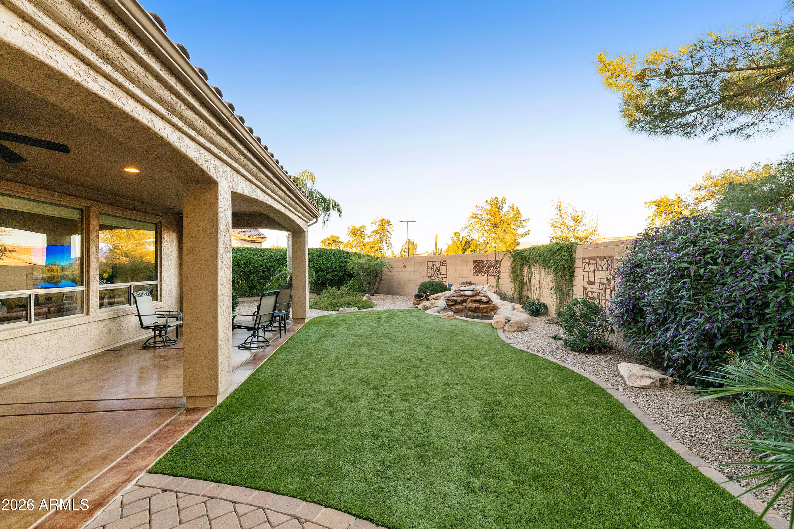 5291 South Sugarberry Court Gilbert, AZ 85298 - Photo 43 of 67 a view of a backyard with plants and patio