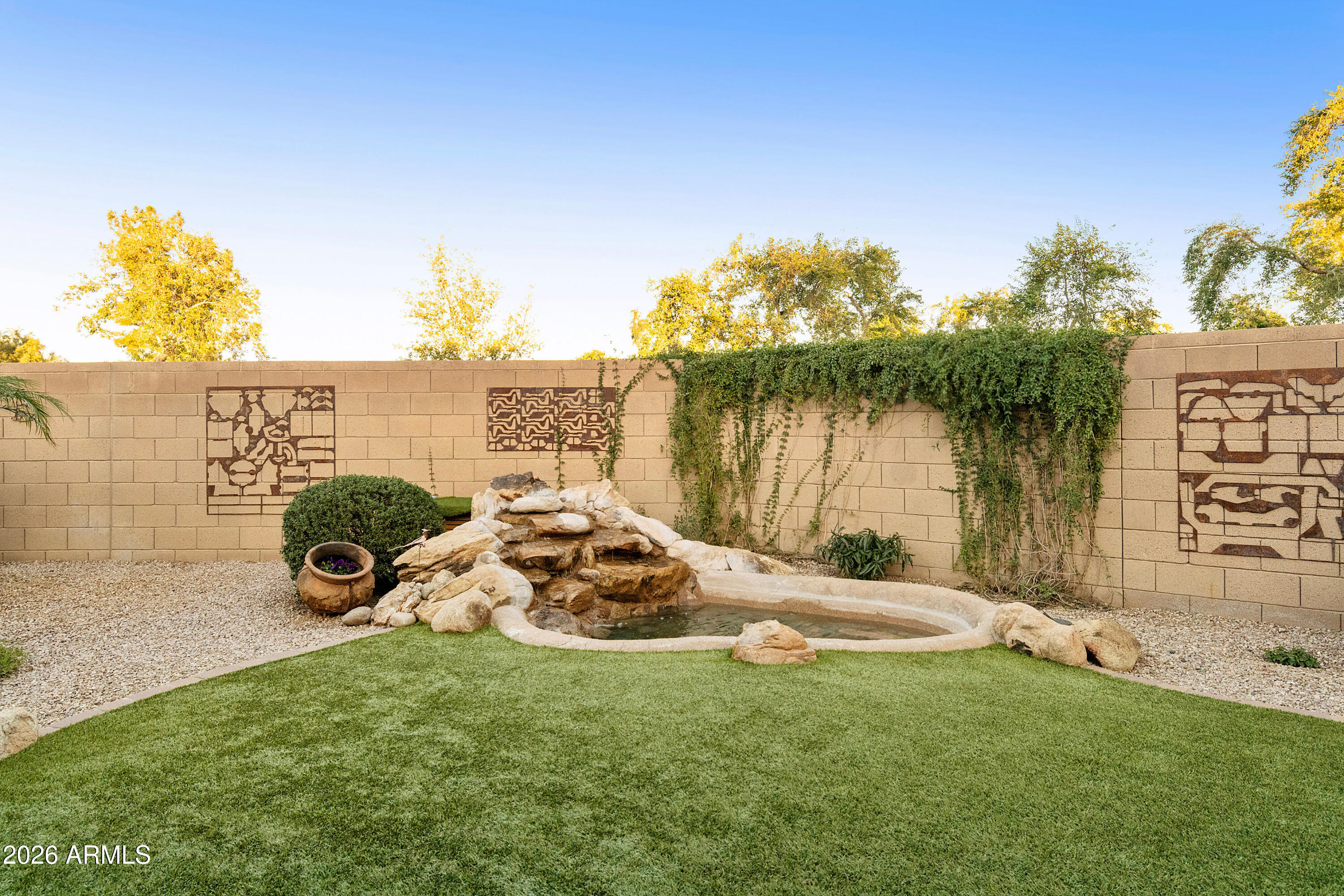 5291 South Sugarberry Court Gilbert, AZ 85298 - Photo 44 of 67 a view of a lake with a big yard