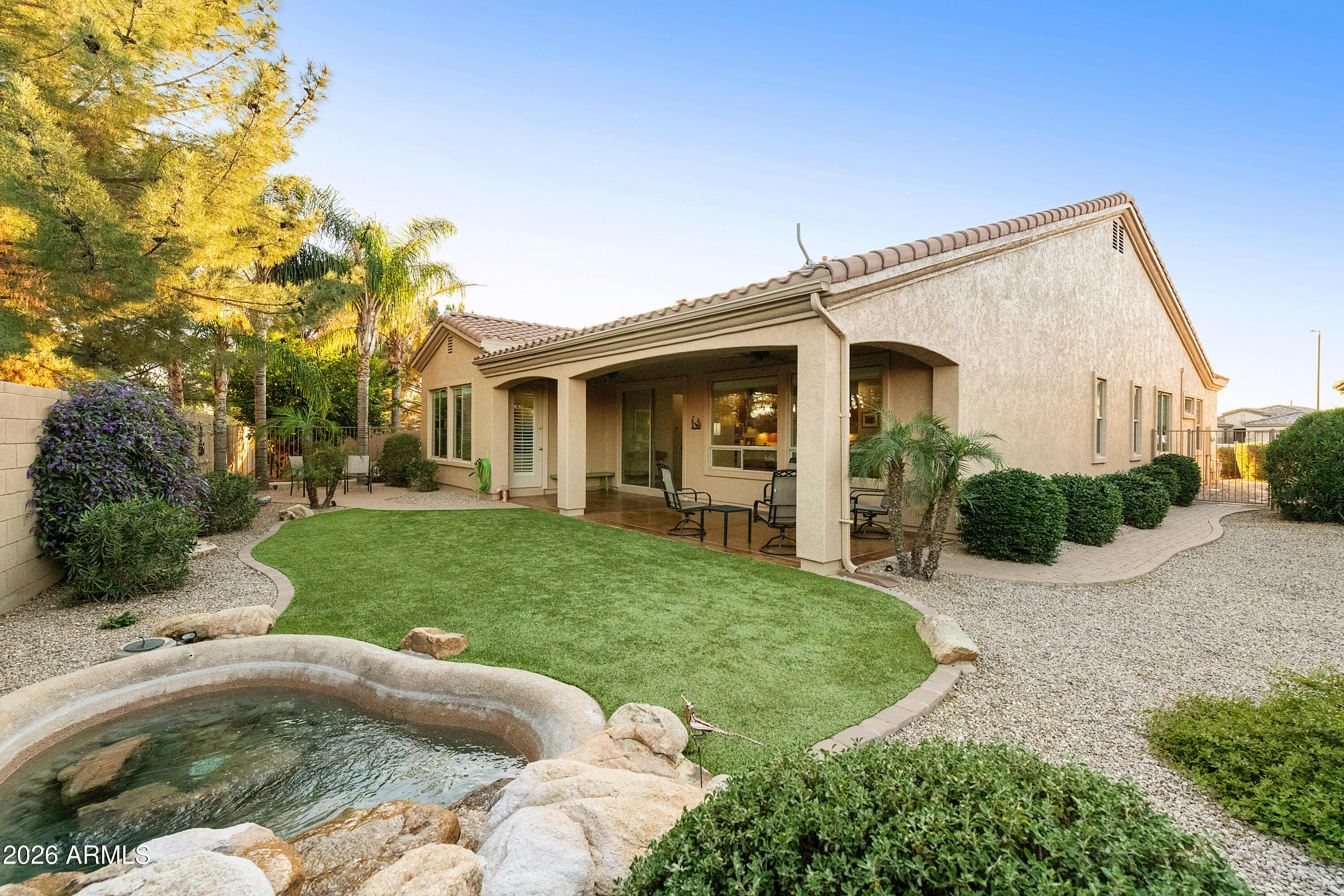5291 South Sugarberry Court Gilbert, AZ 85298 - Photo 47 of 67 a view of a house with a backyard