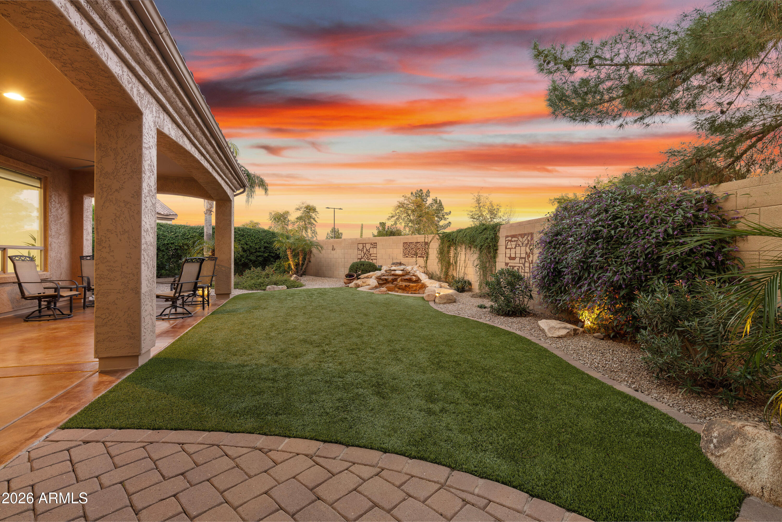 5291 South Sugarberry Court Gilbert, AZ 85298 - Photo 8 of 67 a view of a garden with a slide