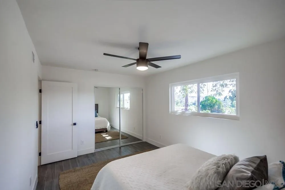 344 Mountain View Road El Cajon, CA 92021 - Photo 22 of 38 a bedroom with bed and window