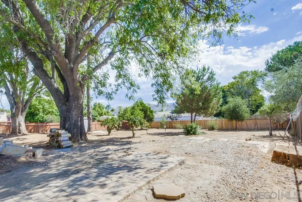 344 Mountain View Road El Cajon, CA 92021 - Photo 30 of 38 a view of outdoor space with deck and tree
