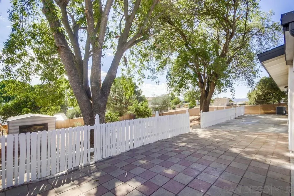 344 Mountain View Road El Cajon, CA 92021 - Photo 31 of 38 a white house that has tree in front of it