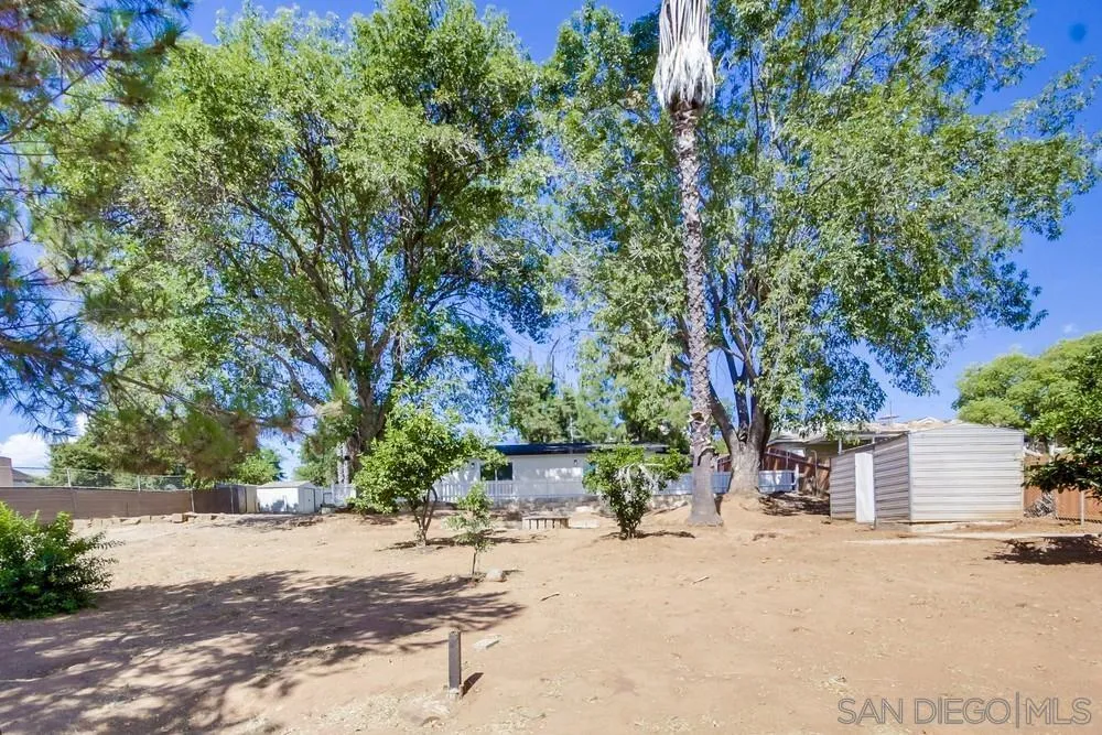 344 Mountain View Road El Cajon, CA 92021 - Photo 33 of 38 a pathway of a house with a yard