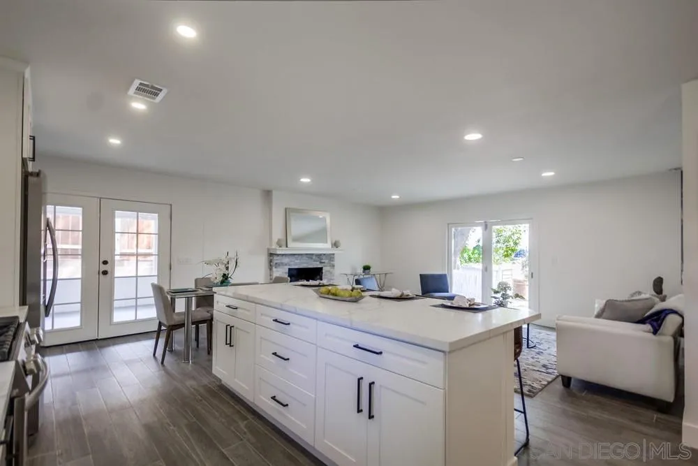 344 Mountain View Road El Cajon, CA 92021 - Photo 6 of 38 a kitchen with a sink stove and cabinets