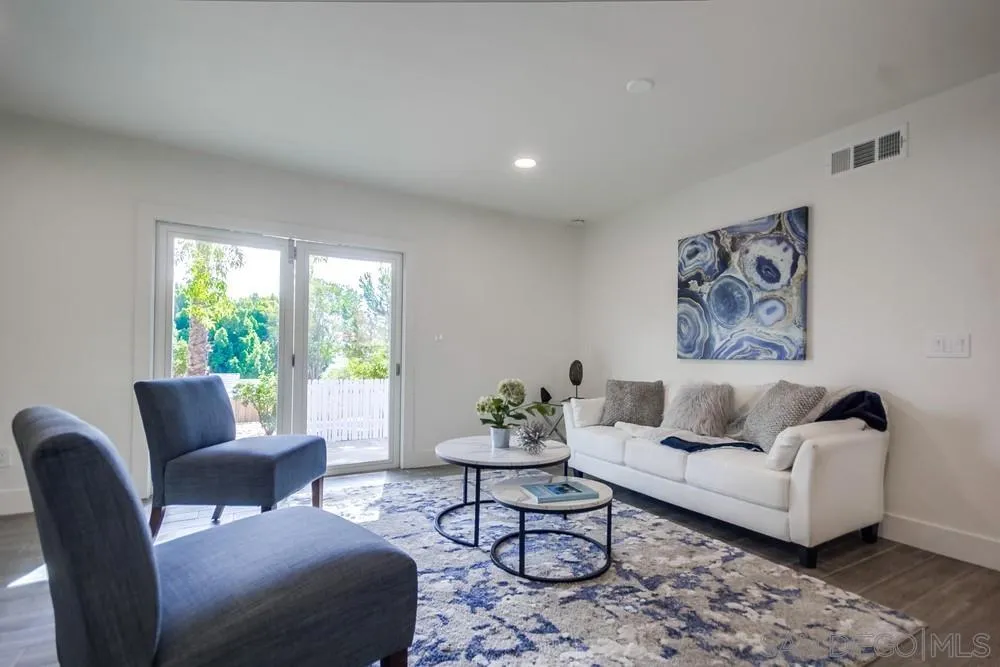 344 Mountain View Road El Cajon, CA 92021 - Photo 8 of 38 a living room with furniture and a large window