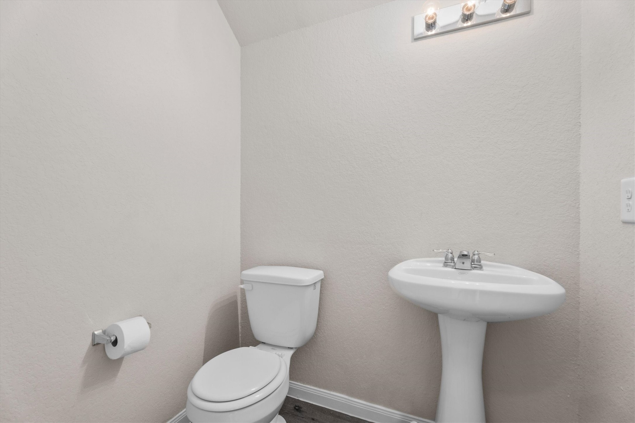 23622 Goodfellow Drive Spring, TX 77373 - Photo 17 of 34 a bathroom with a sink a toilet and mirror