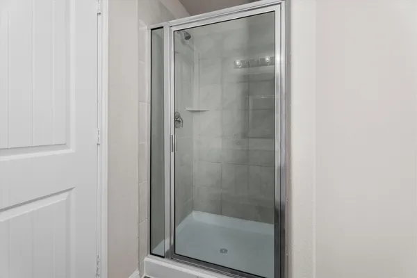 a white bath tub sitting in a bathroom
