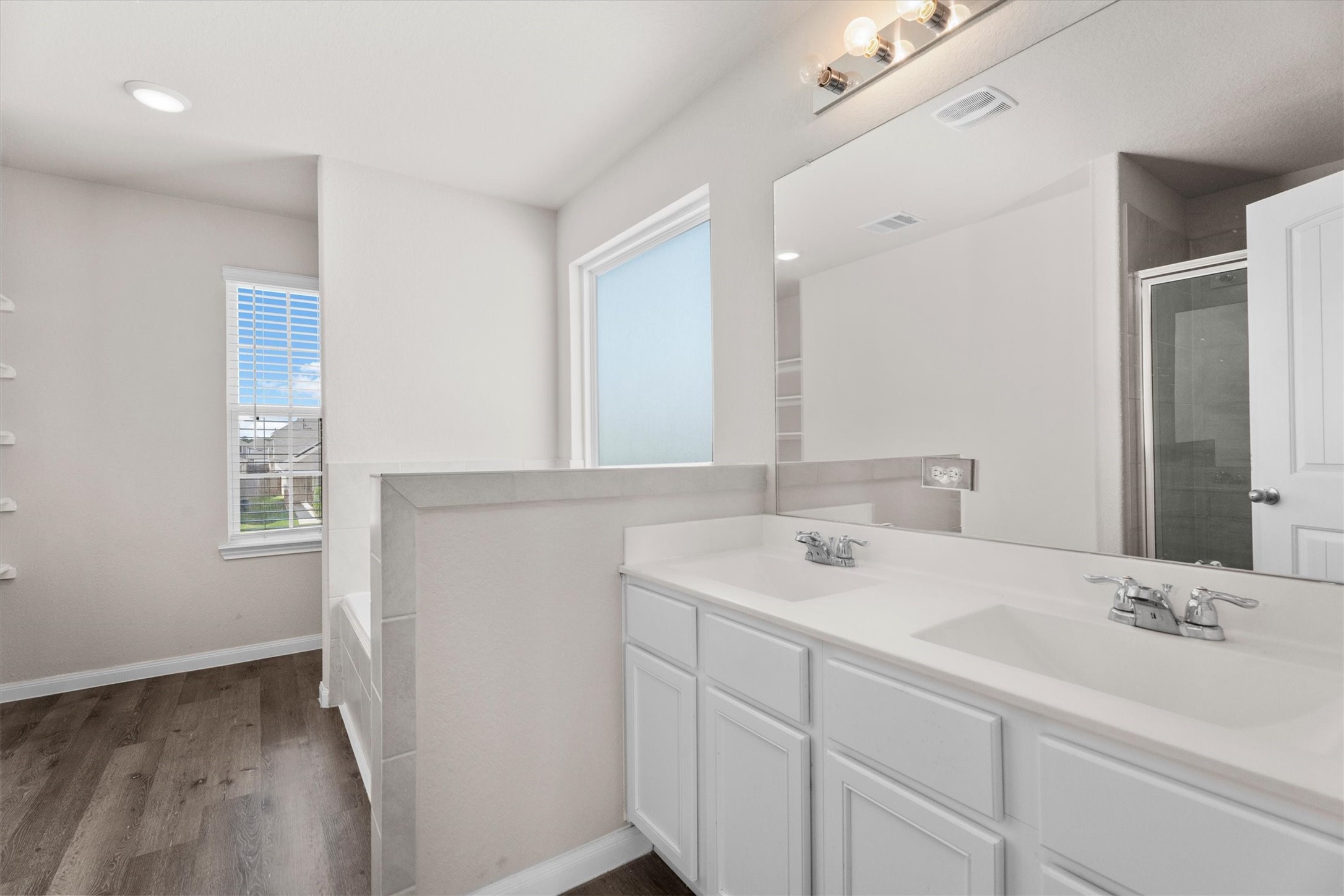 23622 Goodfellow Drive Spring, TX 77373 - Photo 23 of 34 a bathroom with a sink and a mirror