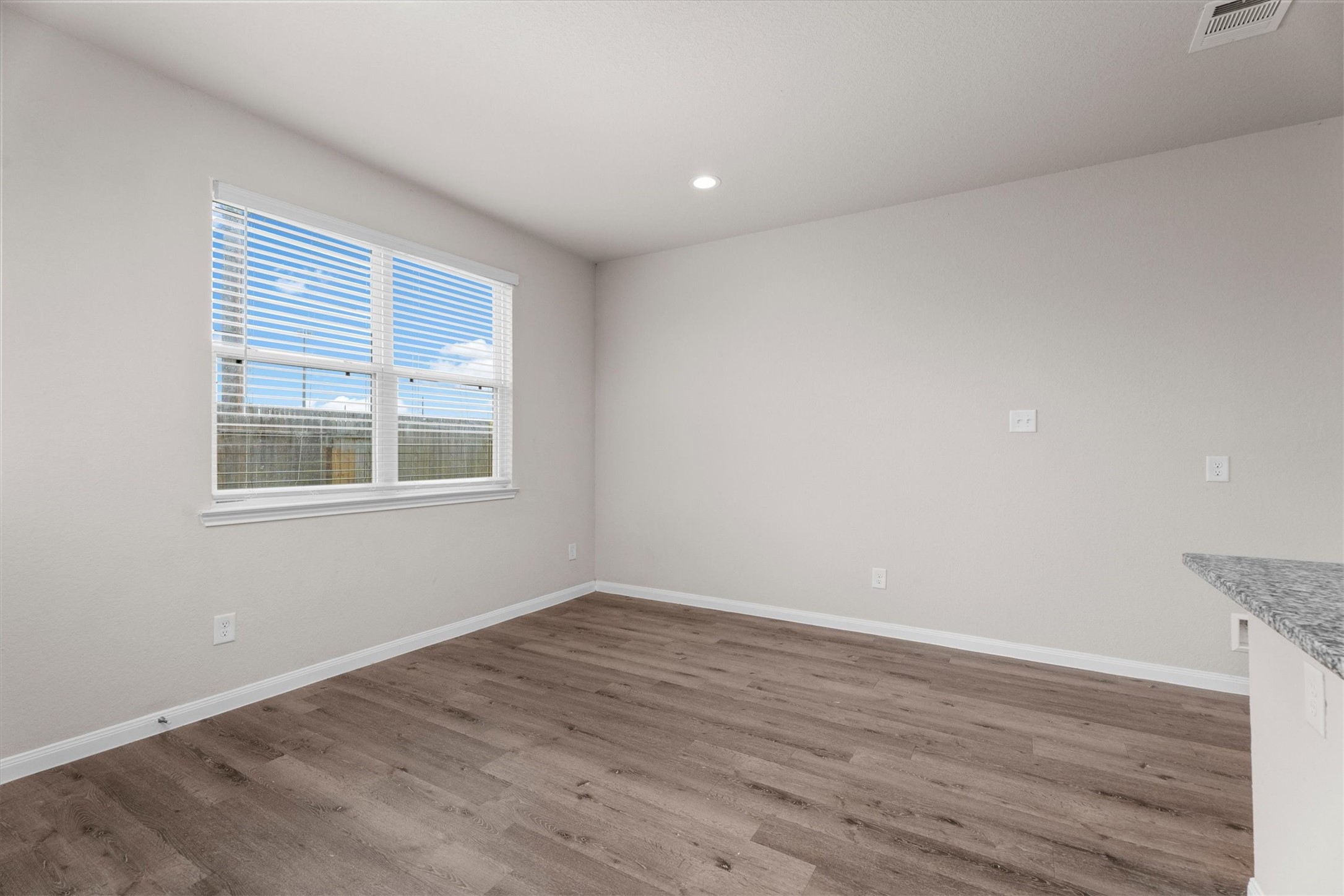 23622 Goodfellow Drive Spring, TX 77373 - Photo 29 of 34 a view of empty room with wooden floor and fan