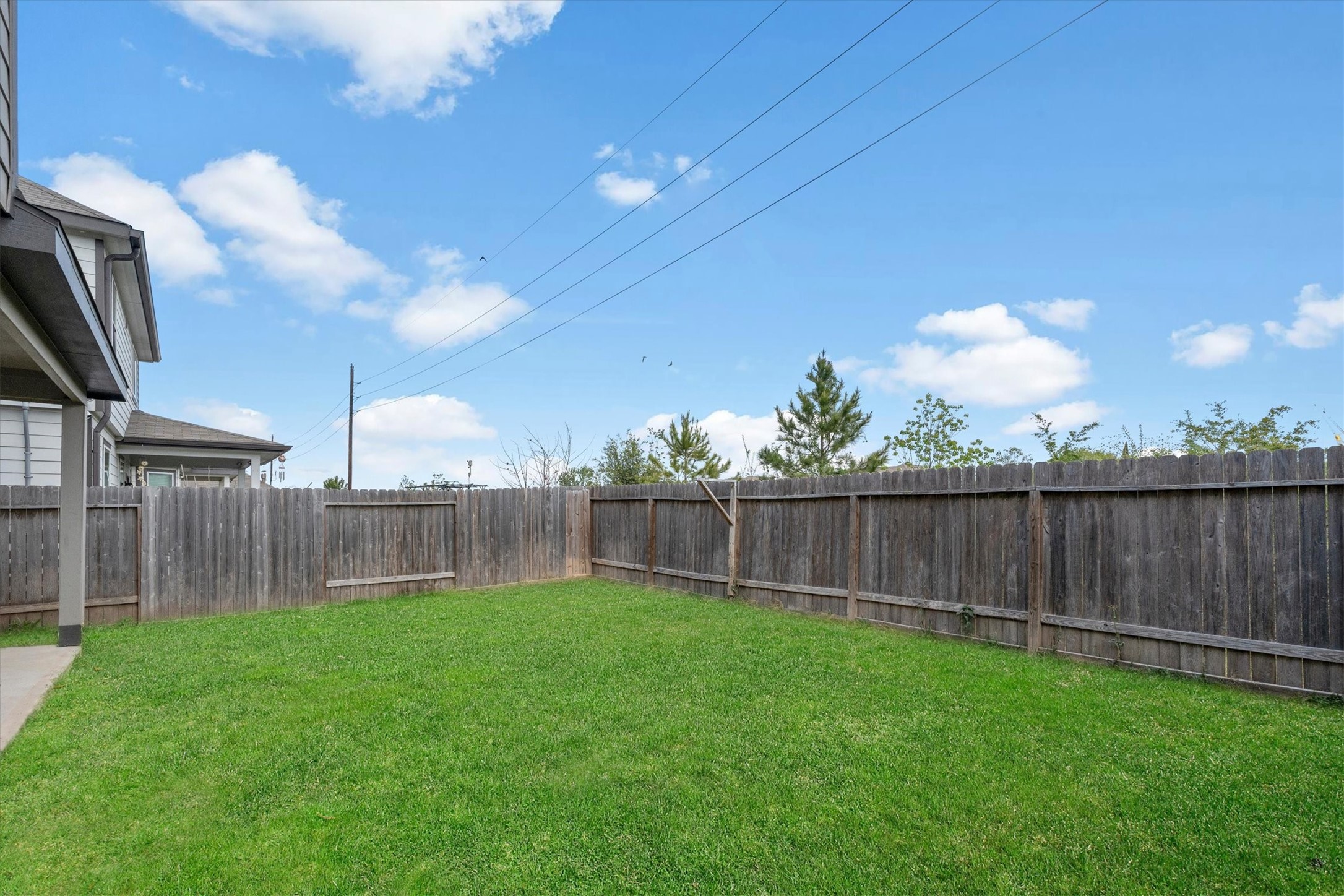23622 Goodfellow Drive Spring, TX 77373 - Photo 33 of 34 a view of a backyard with a garden