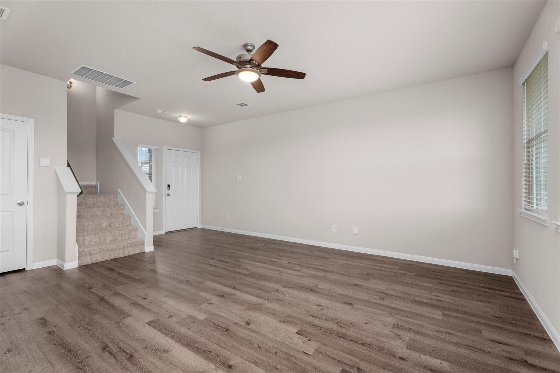 23622 Goodfellow Drive Spring, TX 77373 - Photo 6 of 34 wooden floor in an empty room with a window