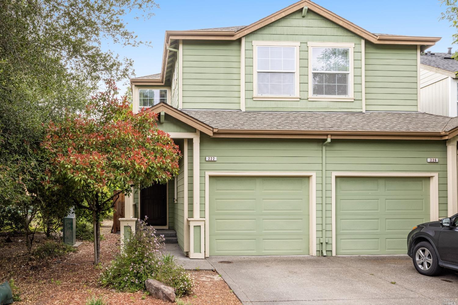 a view of a house with a garage and a garage
