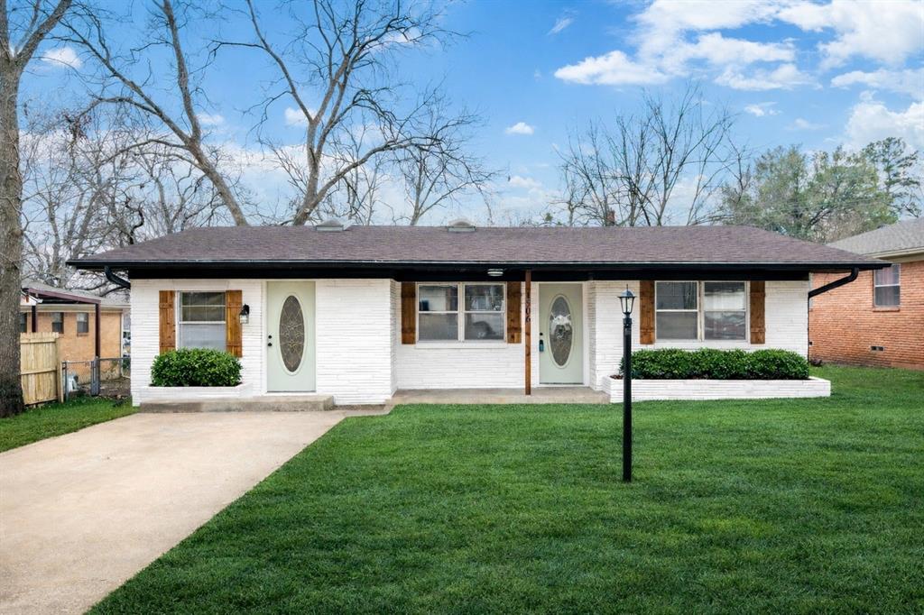 a view of a house with a garden