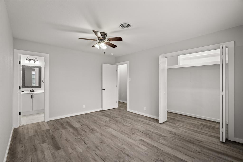 1506 West Main Street Denison, TX 75020 - Photo 17 of 38 a view of empty room with wooden floor