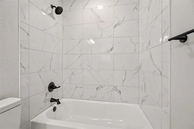 a bathroom with a bathtub