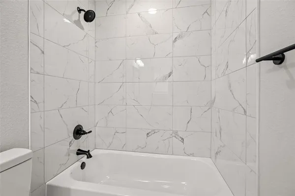 a bathroom with a bathtub