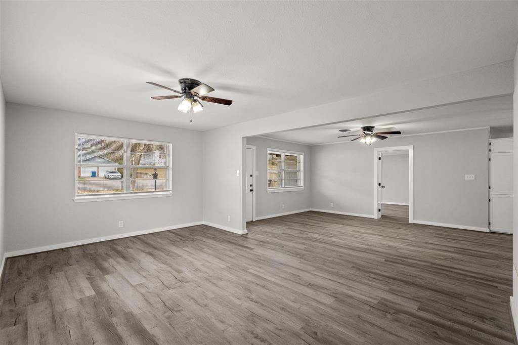 1506 West Main Street Denison, TX 75020 - Photo 29 of 38 an empty room with fan and windows