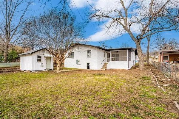 a front view of a house with yard