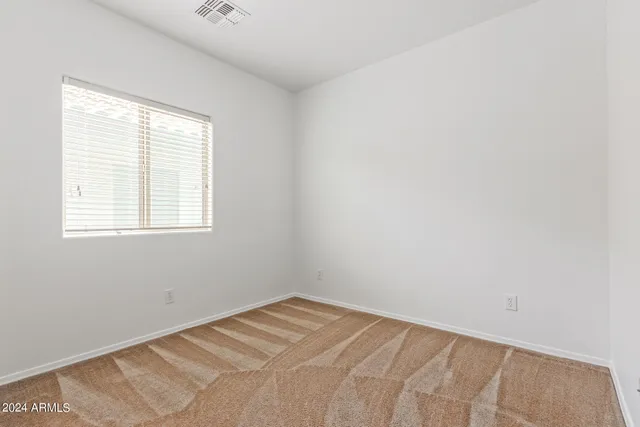 a view of a room with a window