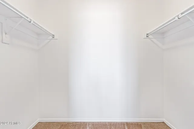 a view of small space with racks on the wall