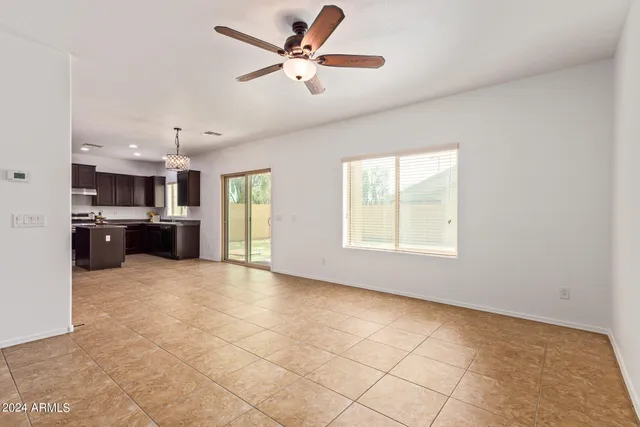 a view of a kitchen with a stove cabinets and a kitchen