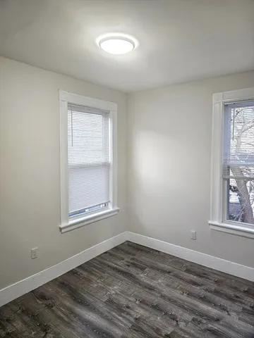a bathroom with a tub and a sink