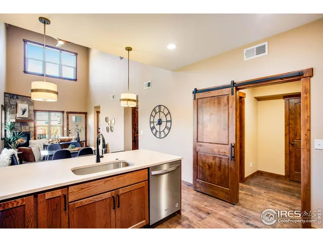 a bathroom with a sink a mirror and a shower