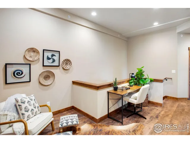 a workspace with furniture and window