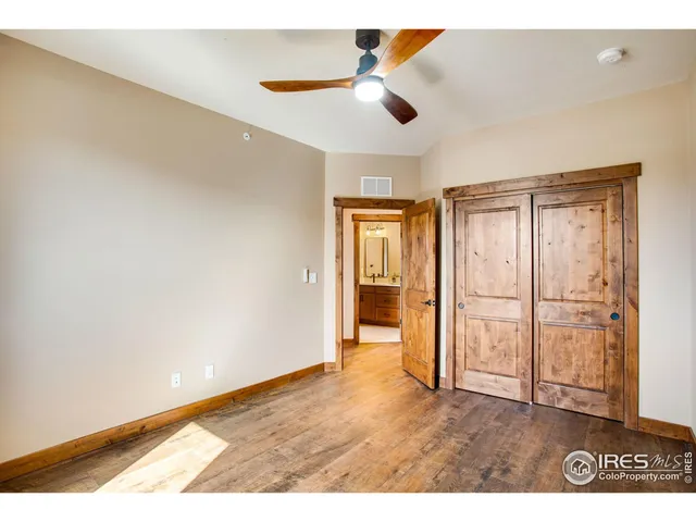 a view of multiple houses with a big yard