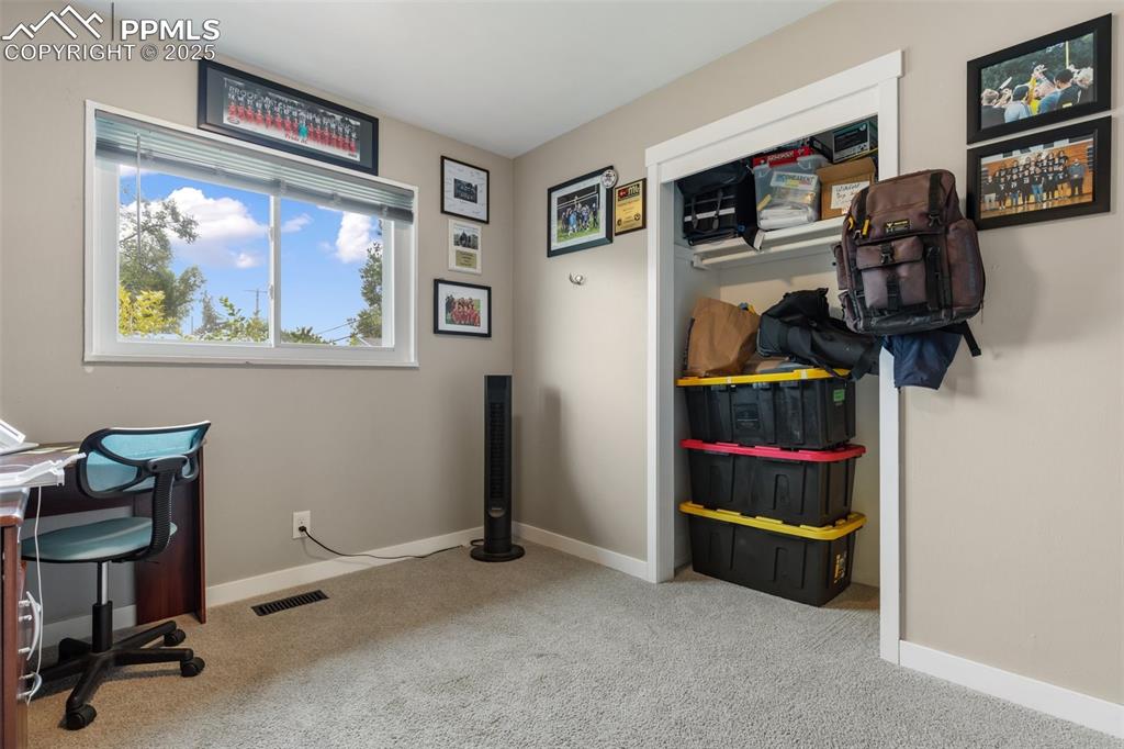 509 Inca Drive Colorado Springs, CO 80911 - Photo 18 of 30 a view of room with workspace and window