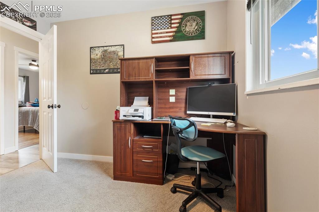 509 Inca Drive Colorado Springs, CO 80911 - Photo 19 of 30 a view of workspace with wooden floor outdoor space