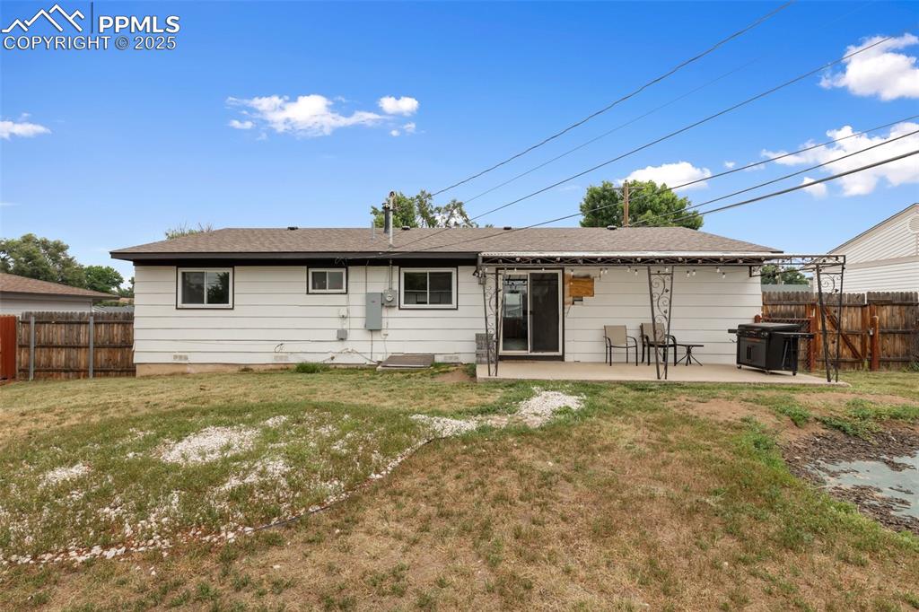 509 Inca Drive Colorado Springs, CO 80911 - Photo 28 of 30 a front view of a house with a garden