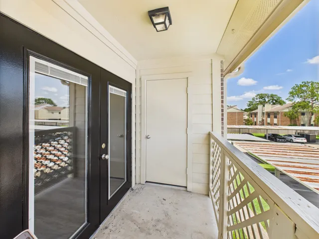 a view of a room with a large window