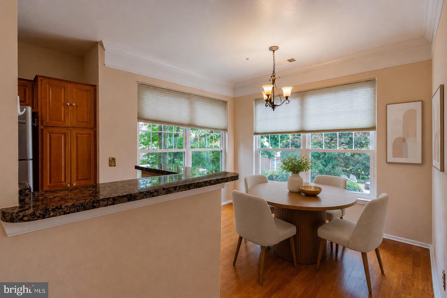 1600 Spring Gate Dr., Unit 2207 McLean, VA 22102 - Photo 11 of 32 a dining room with furniture window and outside view