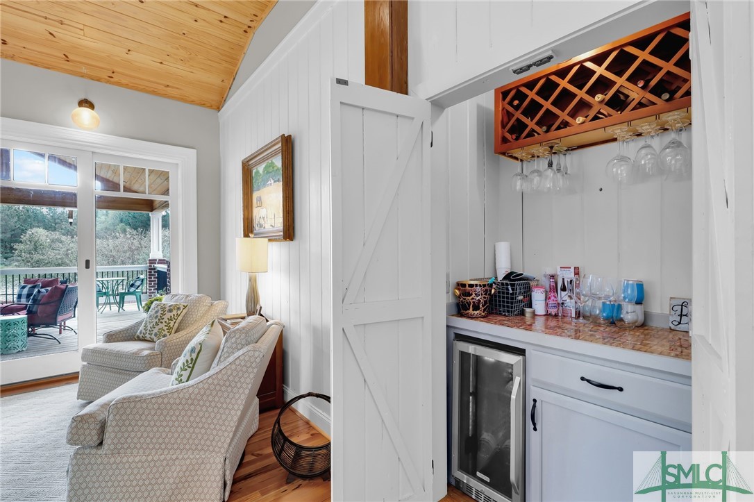 980 Bernard Smith Road Statesboro, GA 30461 - Photo 17 of 49 Great room with hidden bar & wine cooler