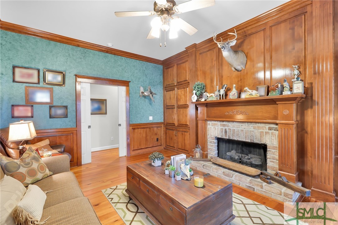 980 Bernard Smith Road Statesboro, GA 30461 - Photo 9 of 49 Den/Living Room w/ Fireplace and hidden cabinets