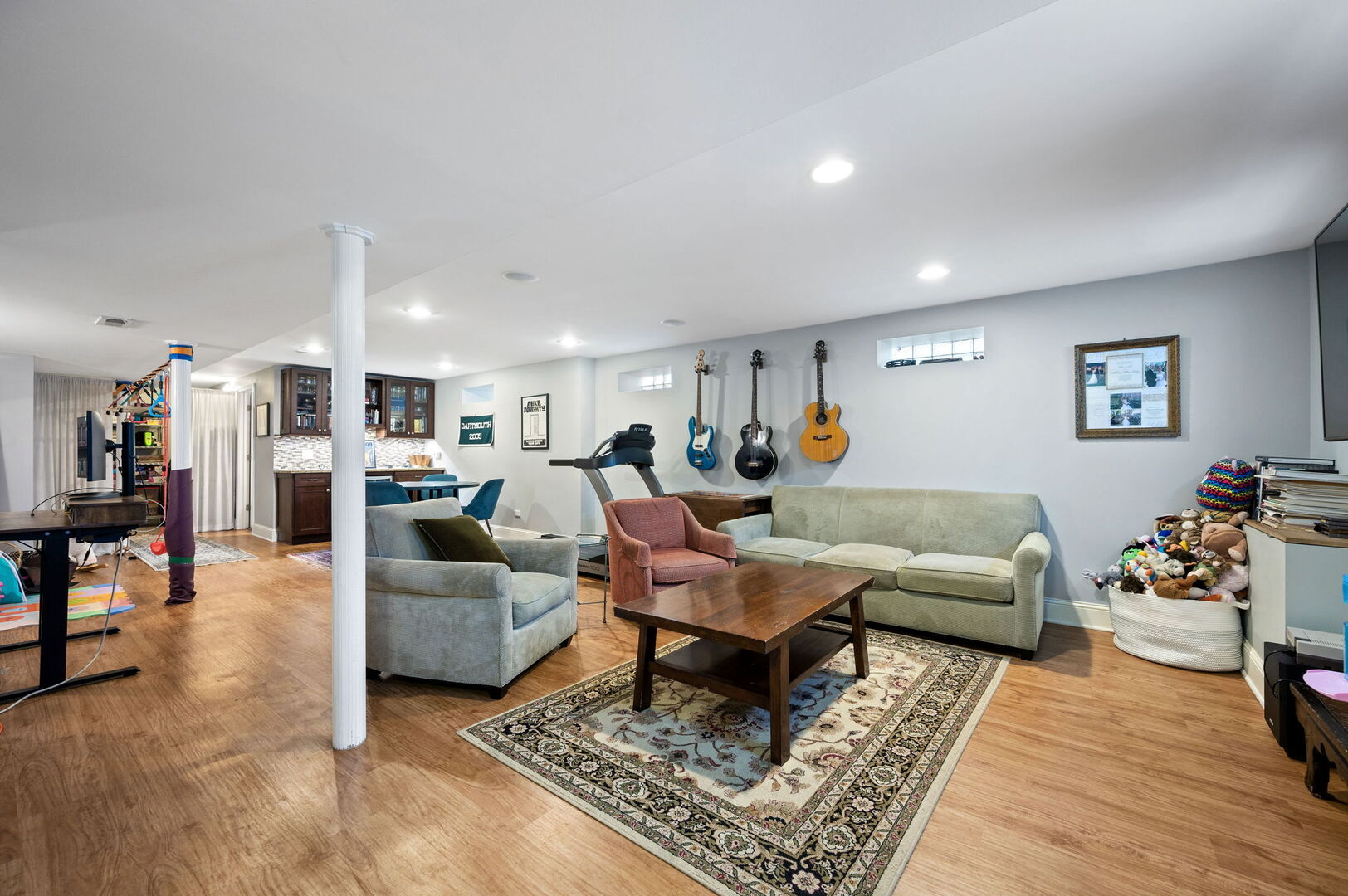 1213 North Paulina Street Chicago, IL 60622 - Photo 26 of 40 a living room with furniture and wooden floor