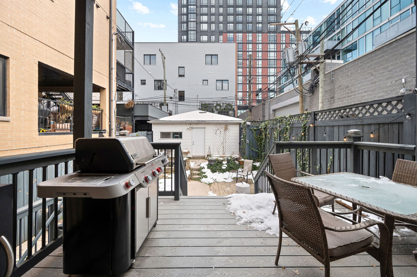 1213 North Paulina Street Chicago, IL 60622 - Photo 32 of 40 a view of a chairs and table on the roof deck