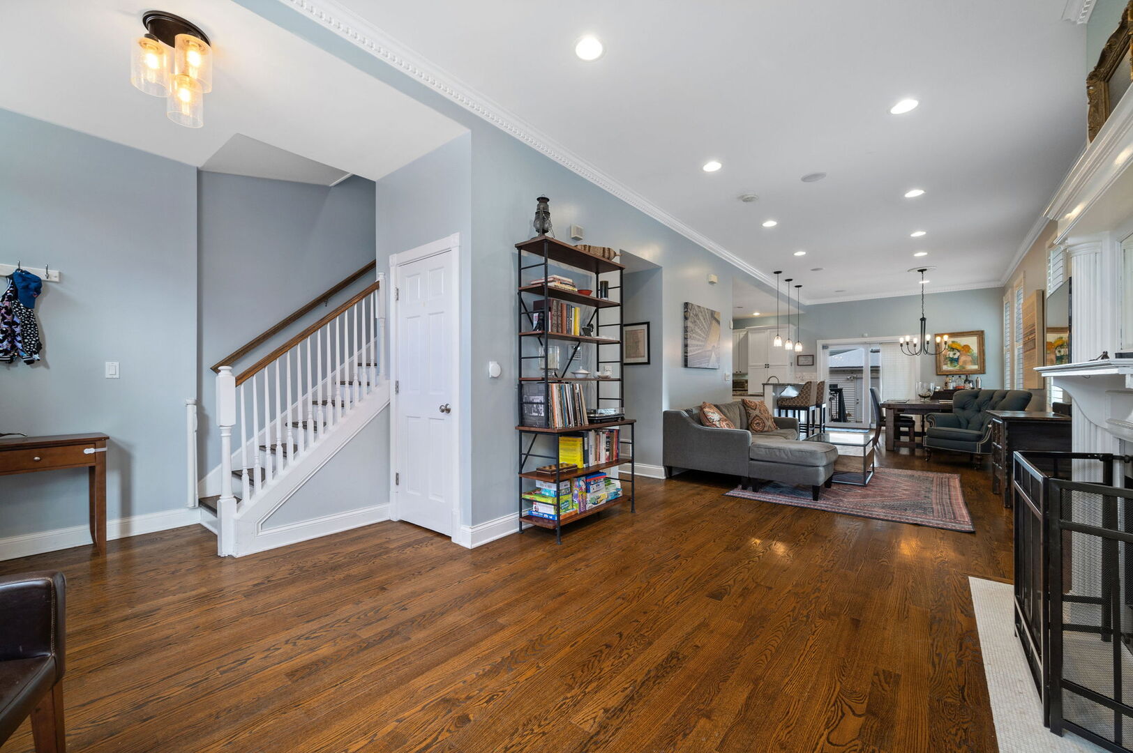 1213 North Paulina Street Chicago, IL 60622 - Photo 5 of 40 a living room with furniture and a wooden floor