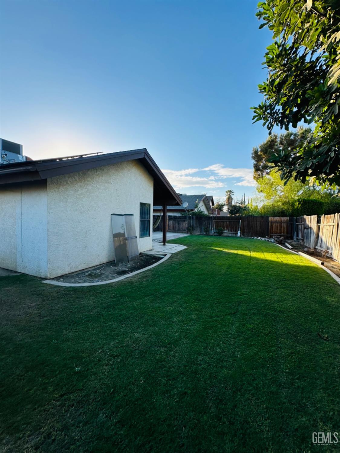 Undisclosed Address Bakersfield, CA 93309 - Photo 28 of 32 a view of a house with a big yard