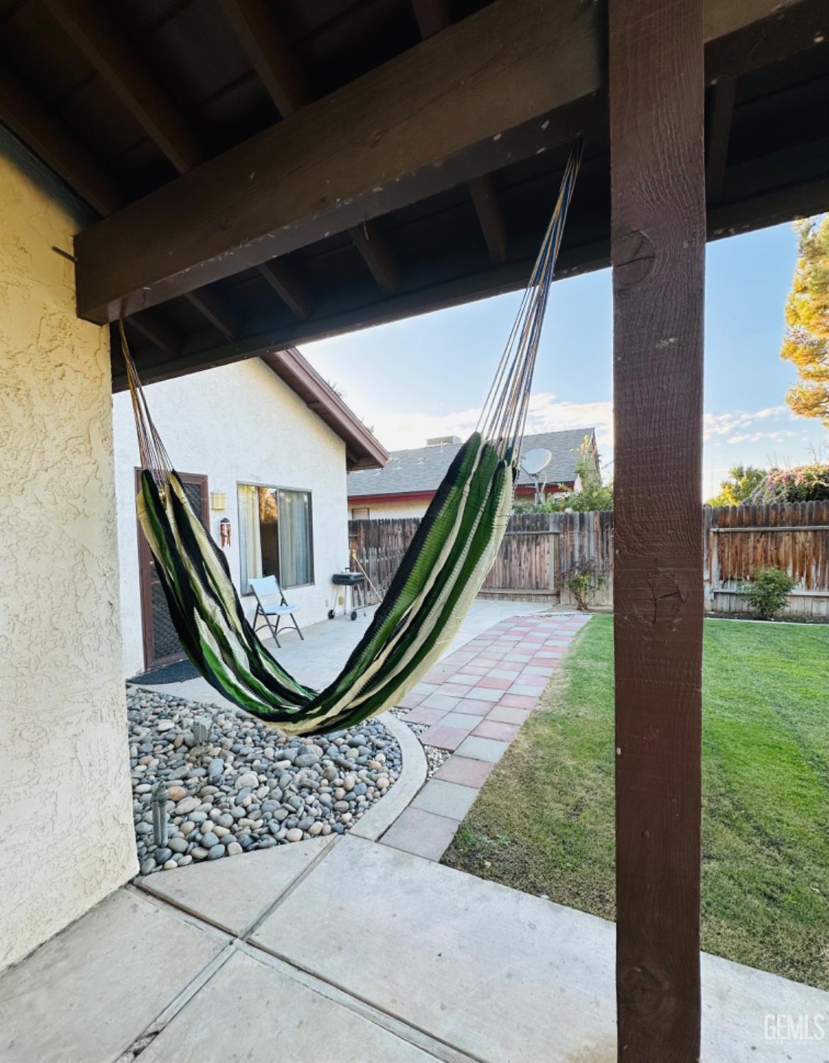 Undisclosed Address Bakersfield, CA 93309 - Photo 29 of 32 a front view of a house with garden