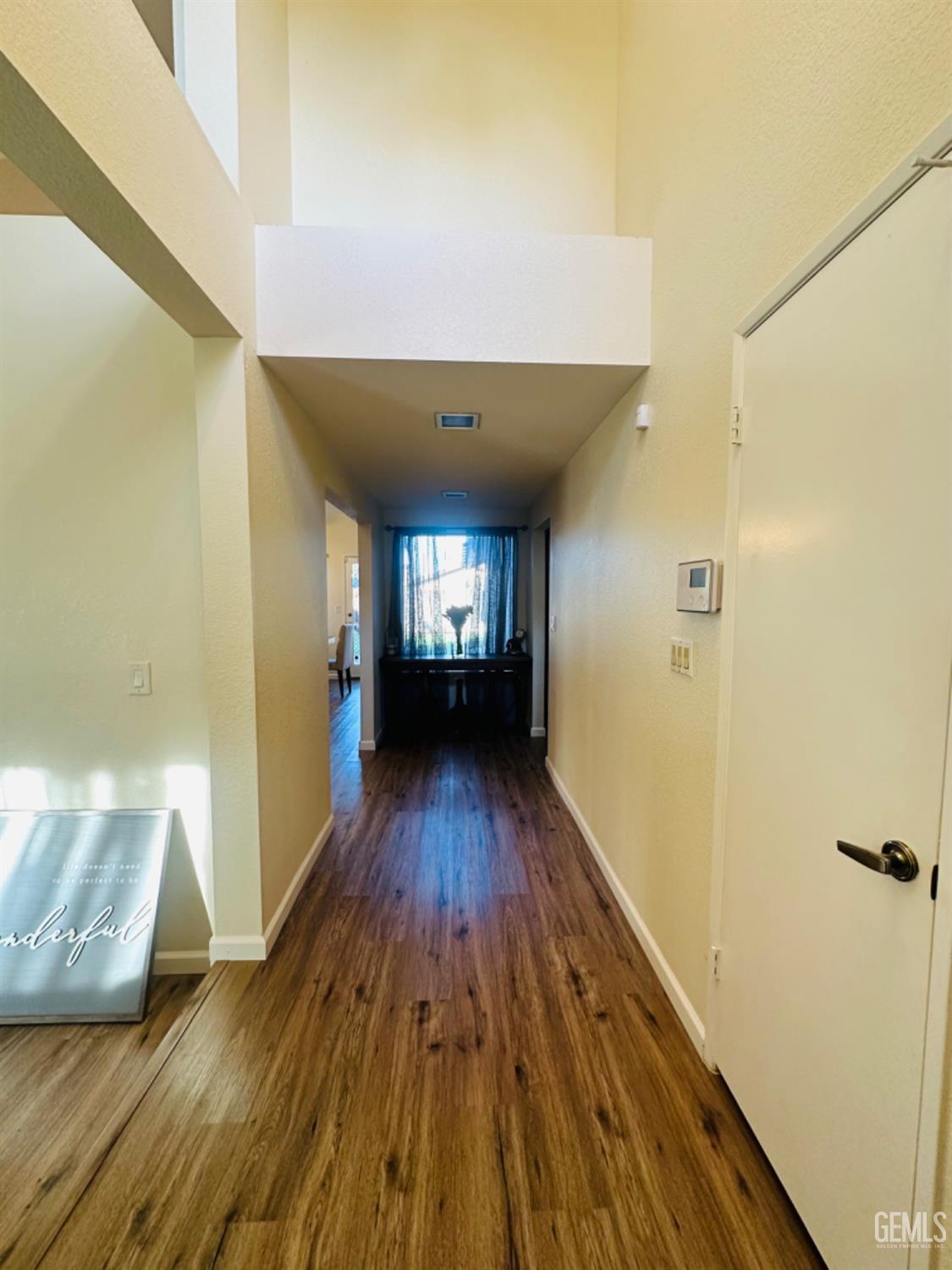 Undisclosed Address Bakersfield, CA 93309 - Photo 7 of 32 a view of entryway with wooden floor
