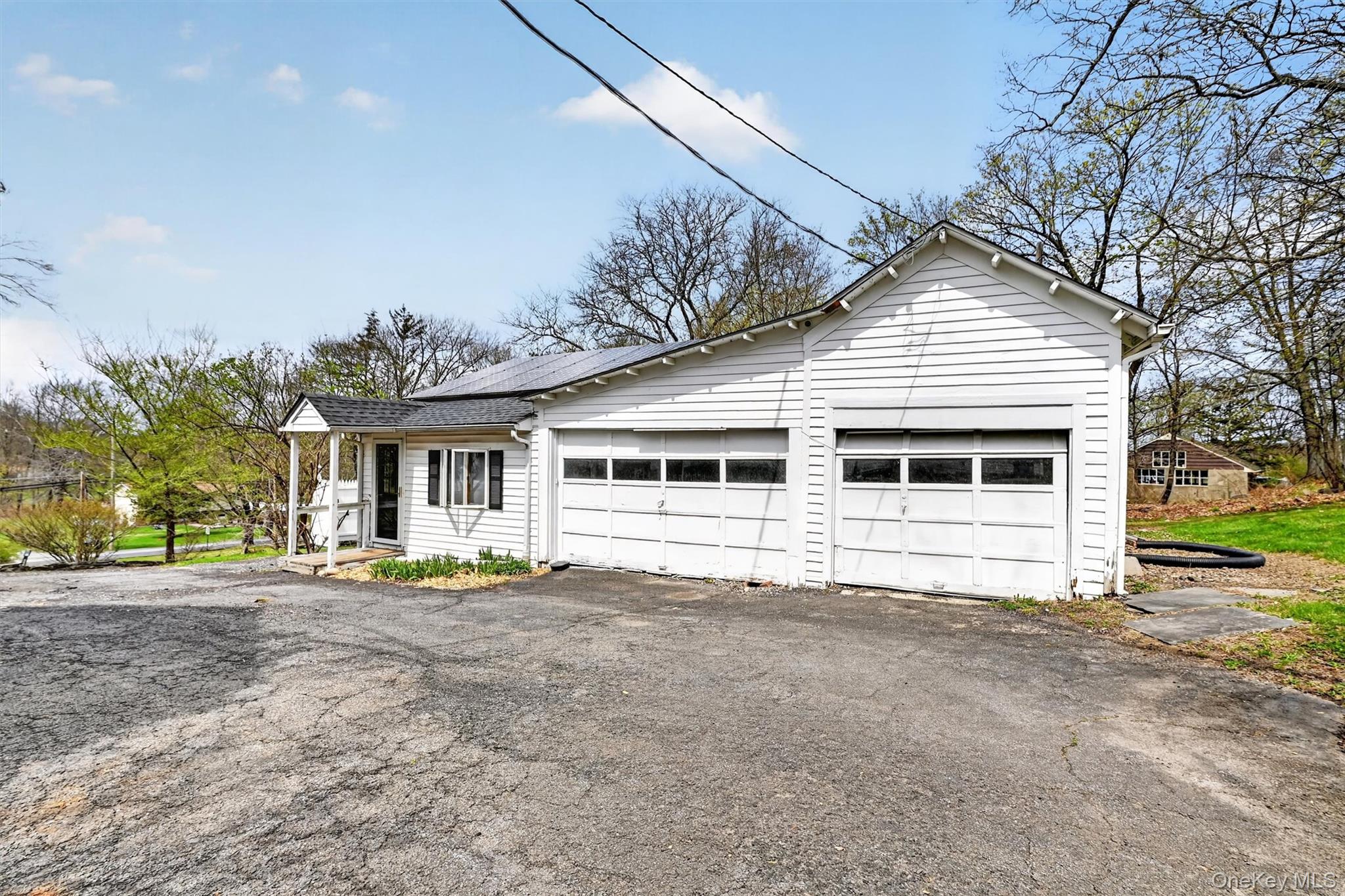 12 Perry Creek Road Washingtonville, NY 10992 - Photo 41 of 48 a front view of a house with a garden